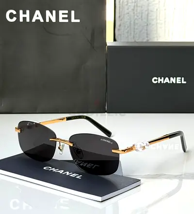 Chanel rimless sunglasses with pearl detail - authentic, like new