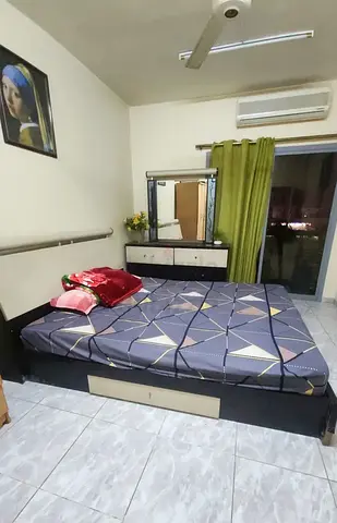 1 bedroom with attached balcony with road view
