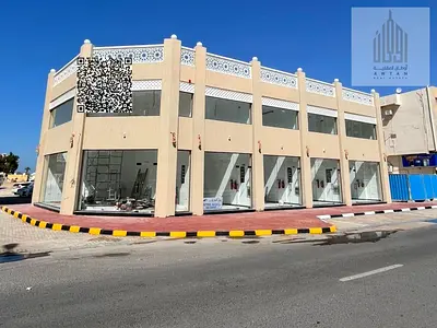 New building, shops opposite Ajman Museum Mosque