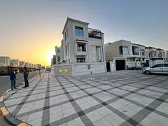 Your dream corner villa, on two main streets, two floors and a roof, on Sheikh Mohammed Bin Zayed St