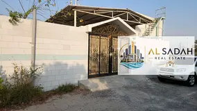 Corner house for sale in Al-Qadisiyah. The house is divided into two sections: the first section has