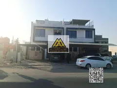 A distinctive townhouse in the Al Zahiyah area of ​​Ajman, in a vibrant location with a direct v