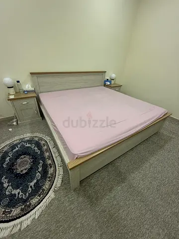 Super king size bed with grey and beige color