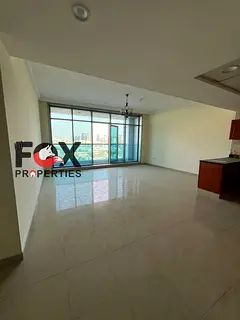 1BR apartment for annual rent in Corniche Residence Ajman, balcony, free AC, built-in wardrobes, pri