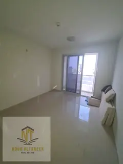 Apartment for annual rent in Al Zahia Muwailih, one room, a hall, a bathroom, and a balcony with an