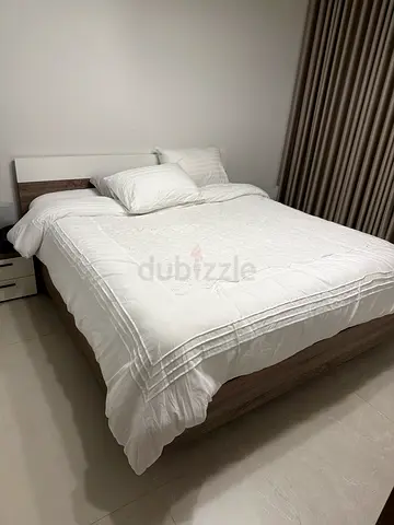 King size bed with dresser, mirror, 2 side tables, wardrobe and shoe cabinet in very good condition