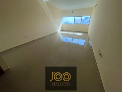 3-bedroom apartment with living room in Al Rashidiya 3 next to Grand Mall, 4 bathrooms, 2 balconies, free AC, spacious, AED 62,000 in 4 installments,