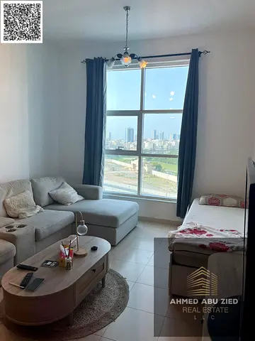 1BR apartment for sale in City Tower with an open view of the Sheikh’s Palace, fully furnished with private parking and an easy payment plan, in a pri