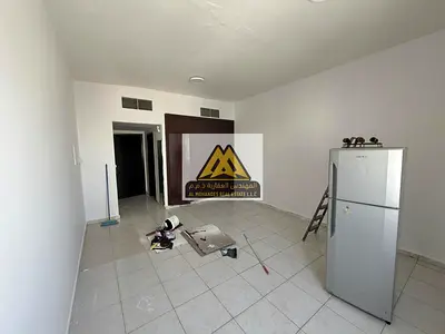 Studio in Al Rashidiya 3, Ajman, large space, semi-open kitchen, central AC, wardrobes, parking, opposite Ajman One Towers, AED 20,000 yearly, 4 or 6