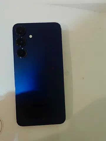 Samsung Galaxy S25+ phone - good condition, blue back, triple camera