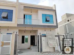 Townhouse with roof for sale, five bedrooms, living room, majlis, and kitchen, priced at AED 1,200,0