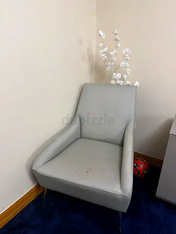 Light single armchair with modern curved design