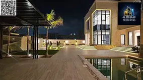 Own the largest villa in Al Yasmin area, 8000 sq ft, with 6 bedrooms, a swimming pool, and a large g