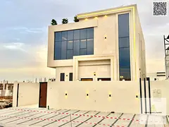 Villa for sale in Ajman | Al Helio 2 area | 5 bedrooms, majlis, hall and maid's room | Freehold 