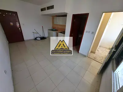 Prime location | Spacious studio with balcony | Central AC | Near Kenz Mall | Main road access | Ex
