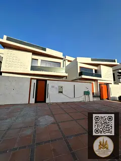 A modern villa with comfortable living spaces in a peaceful location in Al Amerah offering a complet