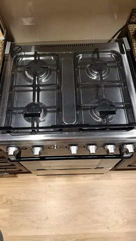 Stainless Steel 4-Burner Gas Stove with Oven - Good Working Condition