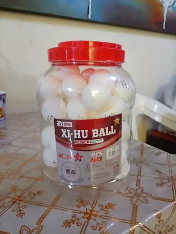Jar of 50 White Xi-Hu Table Tennis Balls - Used, Good Condition