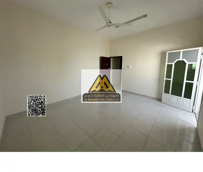 Apartment in Al Rawda 1, Ajman, 2 bedrooms and separate living room, balcony, 2 bathrooms, split AC, AED 32,000 yearly, 4 payments, prime location nea