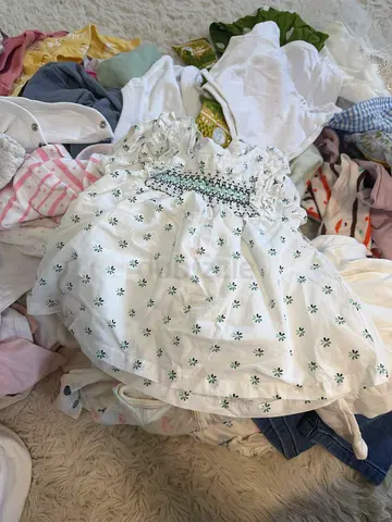 Bundle of baby girl clothes including white embroidered dress - assorted sizes