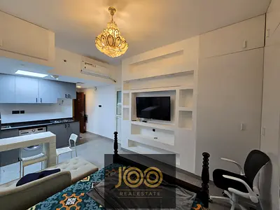 Furnished studio for rent in Orient Towers, Liwara Al Bustan, close to all essential services, rent AED 3,200, deposit AED 700. Joo Real Estate –