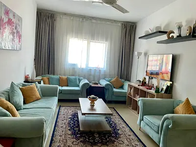 Light teal 3-seater sofa set with armchairs and coffee table