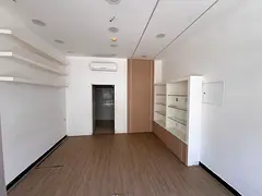 Commercial shop for yearly rent in Muwaihat Ajman, prime location, size 4x6, with ready decoration,