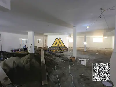 A spacious shop with a mezzanine, located in a prime location within a vibrant area, suitable for various commercial and investment activities. It boa