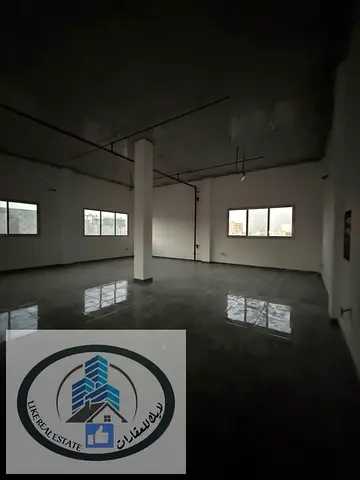 🔥 Warehouse for rent in Al Jurf Industrial Area 2 – Large area + 2 mezzanines + High electricity