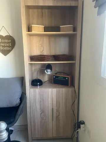 Light oak tall bookcase with lower cabinet - good condition