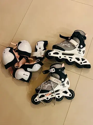 Adjustable Inline Skates Rollerskate with Protective Gear-Kids teen size 32-35 - value 400 sell 150