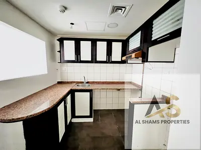 Specious Close kitchen 1BR | Parking + Wardrobe | New Muwaileh