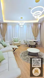 Luxury two-bedroom apartment, living room, and three bathrooms (Orient Towers - Ajman), with direct