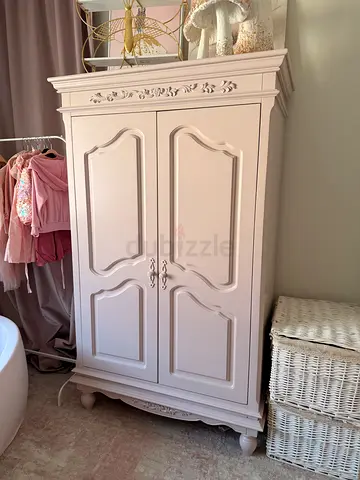 Vintage-style painted armoire / wardrobe in soft blush white pink