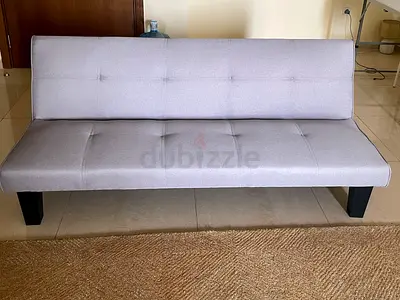 Light grey fabric futon sofa bed - simple modern design