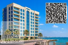 For sale: a mixed-use residential and commercial building on Ajman Corniche promenade.