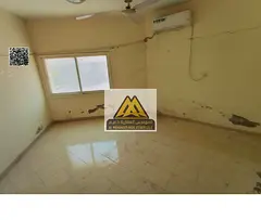 Apartment in Al Mowaihat 3, Ajman, 1 bedroom and living room, split AC, prime building, AED 28,000 y