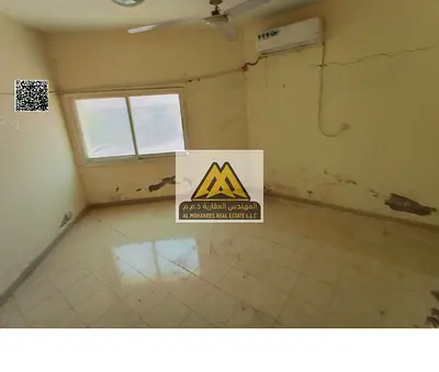 Apartment in Al Mowaihat 3, Ajman, 1 bedroom and living room, split AC, prime building, AED 28,000 yearly, 4 payments, suitable for workers or compani