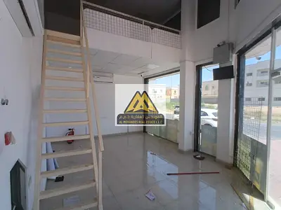 Shop with Mezzanine for Rent in Al Rawda 3 Ajman Prime Location Suitable for All Activities