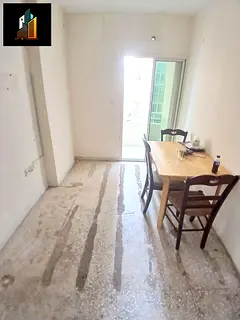family building neat and clean with nice looking area around Cornish side