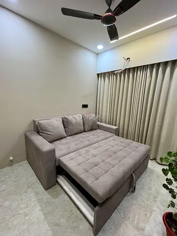 Light grey pull-out sofa bed