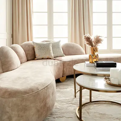 Beige velvet curved corner sofa