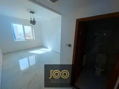 Super deluxe 1-bedroom apartment in Al Naeemiya 3, Khalifa Street, 2 bathrooms, balcony, open view, spacious, AED 40,000, 4–5 payments, AED 5k deposit