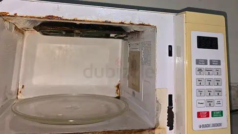 Used Black  Decker Microwave - Needs Cleaning (Interior Rust  Stains) and fuse not working