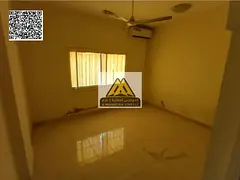 A great opportunity for annual rent in Al Muwaihat 3, Ajman. A one-bedroom apartment with split air