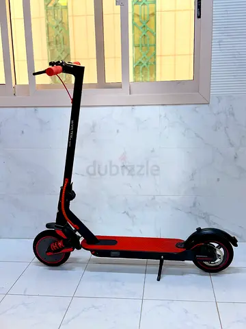 Used Electric Scooter - almost new Condition, Red/Black
