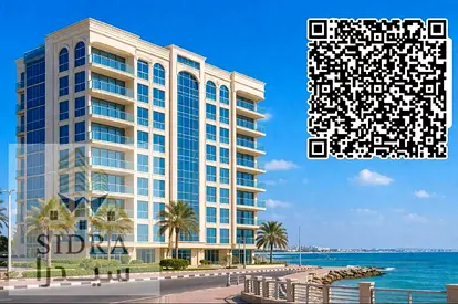 For sale: a mixed-use residential and commercial building on Ajman Corniche promenade.