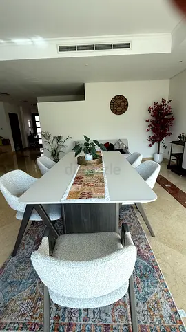 Modern dining table with 6 upholstered chairs - good condition