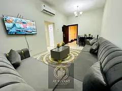 Furnished two-bedroom apartment with living room, Ajman Corniche, all bills included