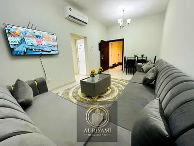 Furnished two-bedroom apartment with living room, Ajman Corniche, all bills included
